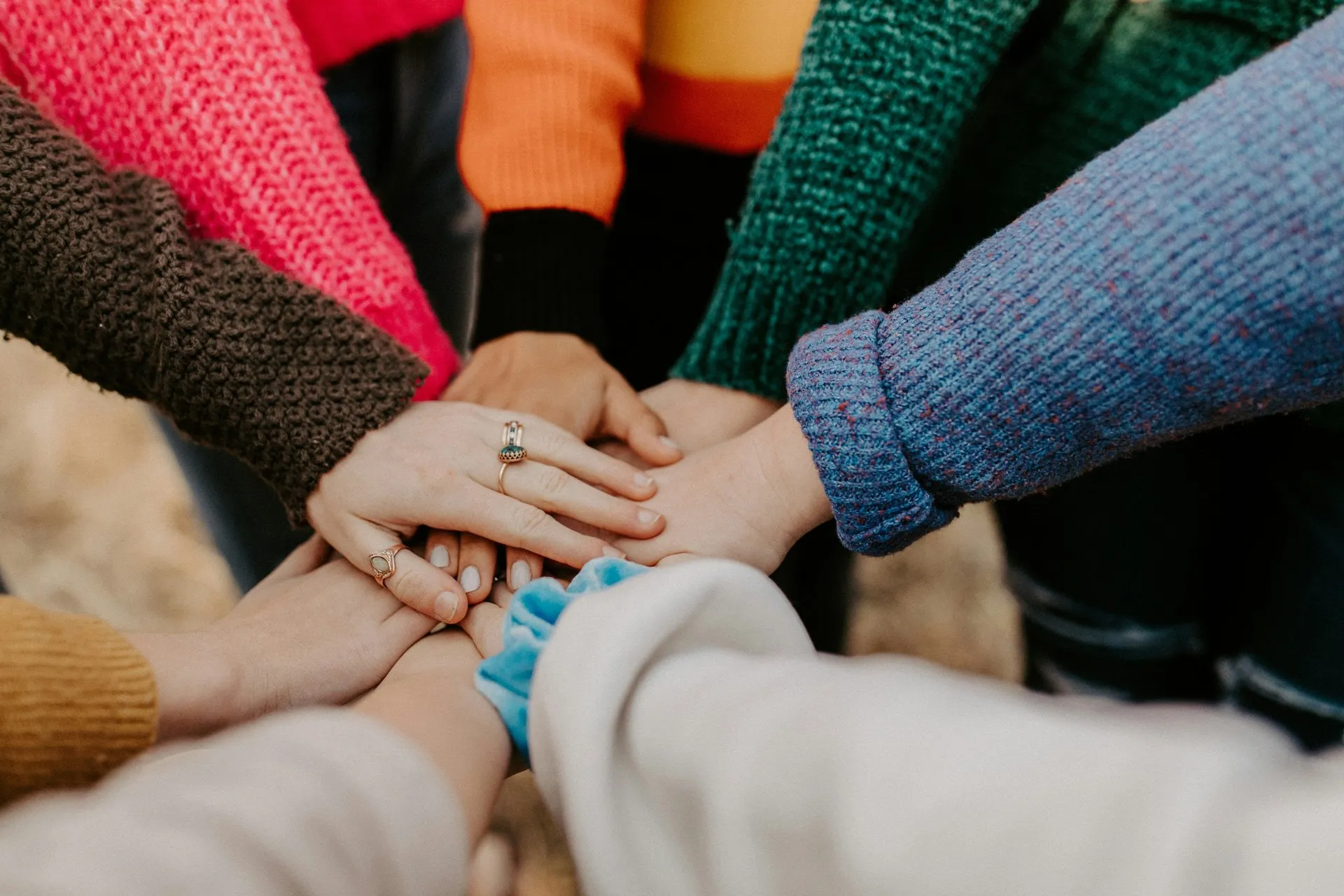 A team with hands joined